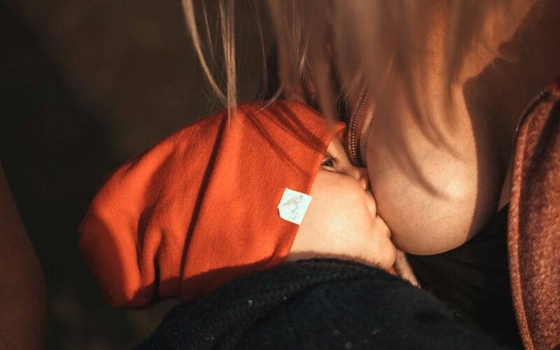 baby's orange knit cap